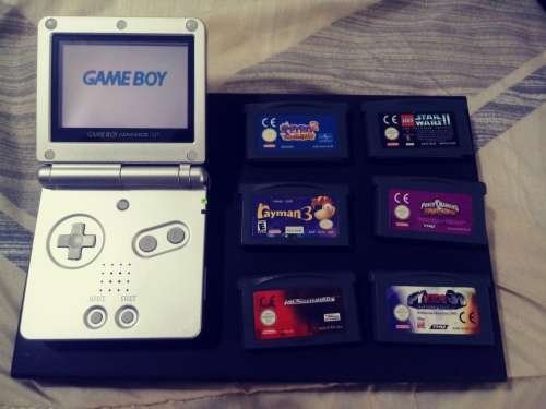 Game Boy Advance SP with 6 Games and Charger ( Good Condition)