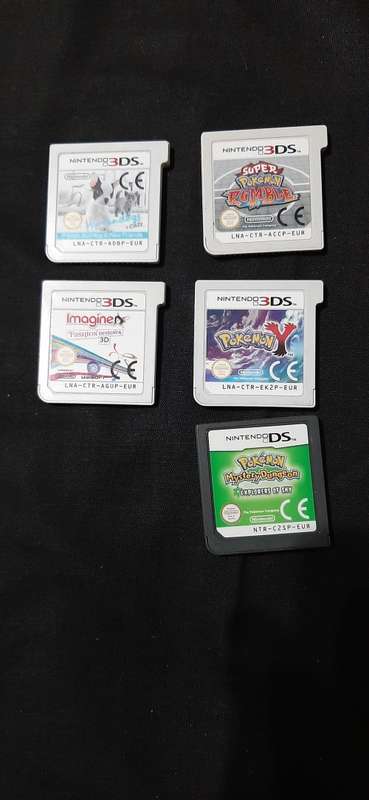 New Nintendo 3DS XL + 10 Games ( very  good condition)