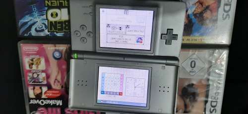 Nintendo DS Grey lots of scratches + 9 games
