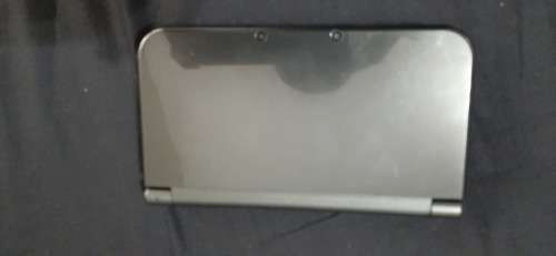 New Nintendo 3D XL ( has a small craxk on the right upper screen corner)