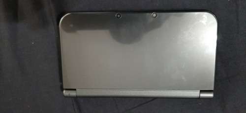 New Nintendo 3D XL ( has a small craxk on the right upper screen corner)
