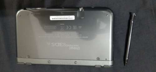 New Nintendo 3D XL ( has a small craxk on the right upper screen corner)