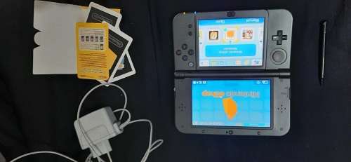 New Nintendo 3D XL ( has a small craxk on the right upper screen corner)