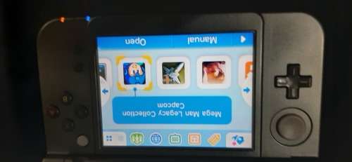New Nintendo 3D XL ( has a small craxk on the right upper screen corner)