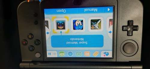 New Nintendo 3D XL ( has a small craxk on the right upper screen corner)
