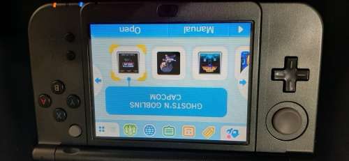 New Nintendo 3D XL ( has a small craxk on the right upper screen corner)