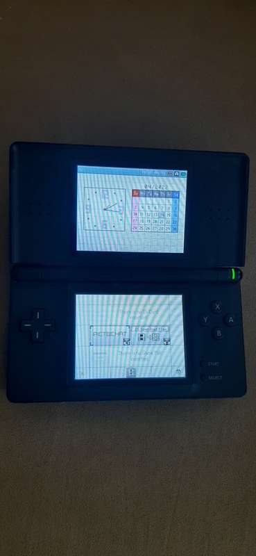 Nintendo DS Black ( Good condition) with games