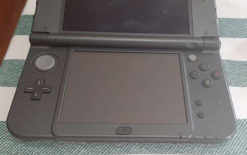 Nintendo New 3DS XL ( Good condition)