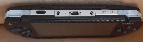 PSP 1001 ( Very Good condition) + 4 games