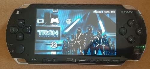 PSP 1001 ( Very Good condition) + 4 games