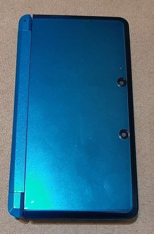 Nintendo 3DS Blue ( Good Condition) + 4 Games