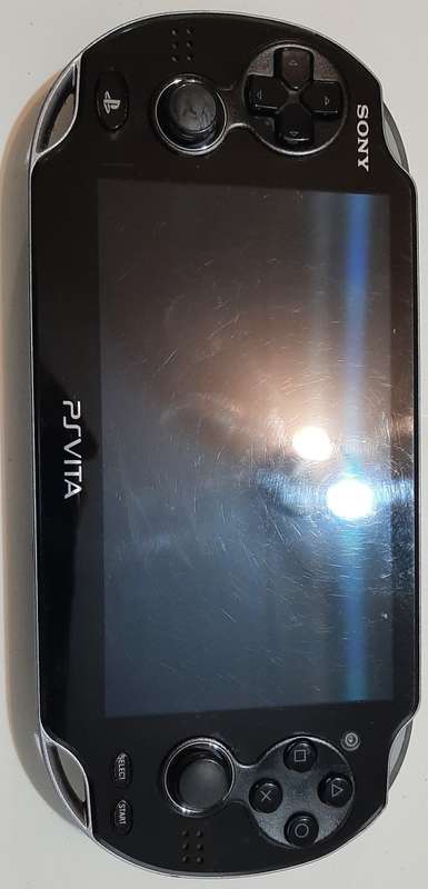 PS Vita Fair Condition + 2 games and 16 GB memory.
