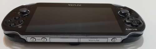 PS Vita Fair Condition + 2 games and 16 GB memory.