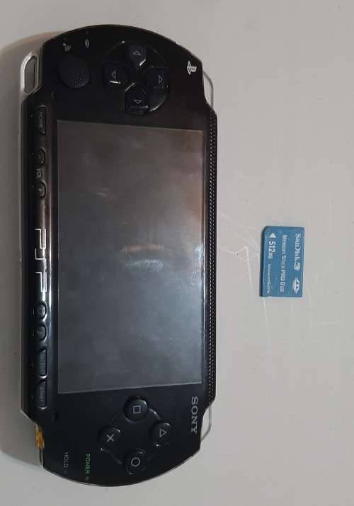 PSP 1000 ( Very Good Condition + 6 Games)