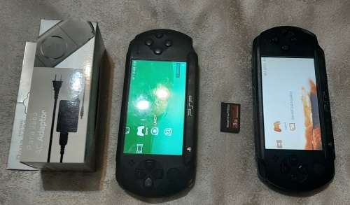 PSP Street x 2 has lots of sctatches but works 100%. ( One Charger)