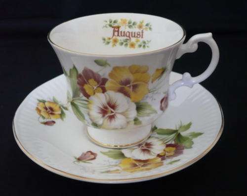 An Elizabethan Staffordshire "August" TEA CUP AND SAUCER