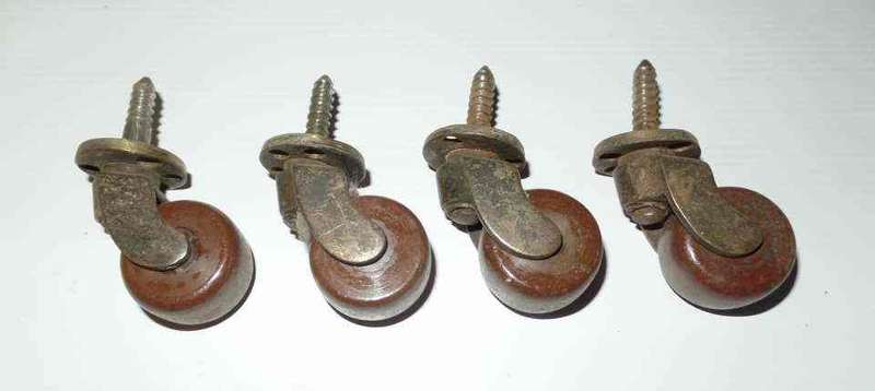 ANTIQUE BRASS & PORCELAIN  CASTORS