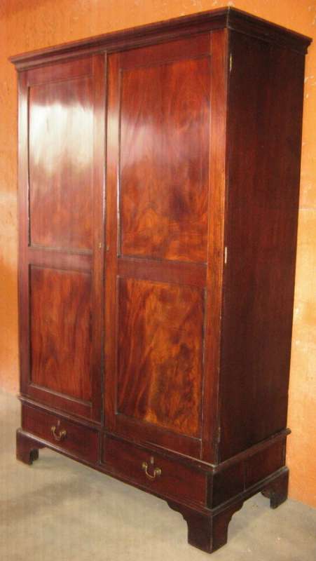 ANTIQUE FLAME MAHOGANY CUPBOARD