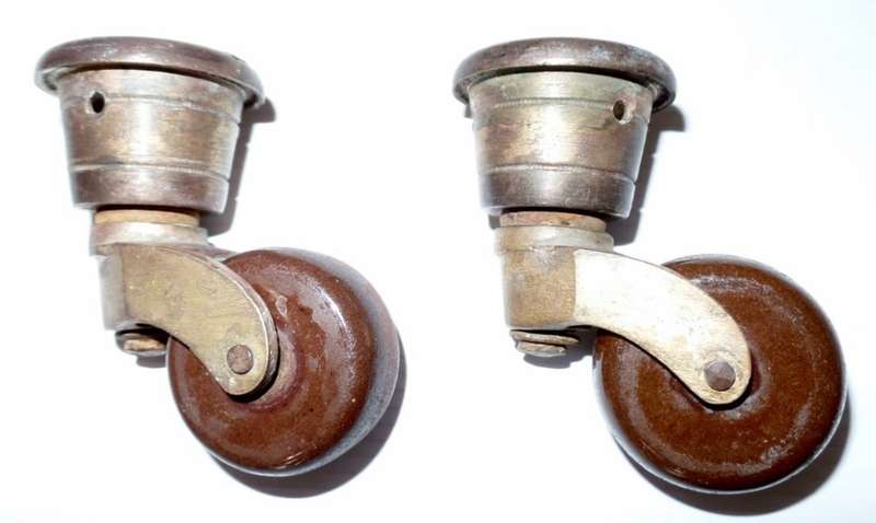 ANTIQUE VICTORIAN CERAMIC AND BRASS CUP CASTORS
