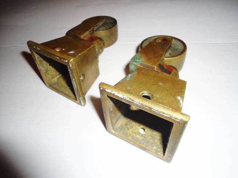 ANTIQUE BRASS CASTORS
