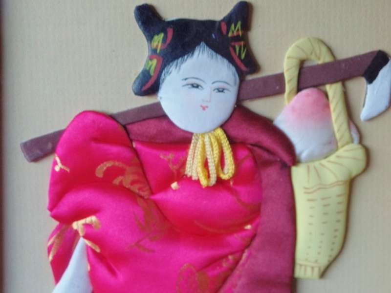 VINTAGE FRAMED SET OF FOUR CHINESE SILK APPLIQUE FIGURES