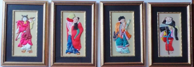 VINTAGE FRAMED SET OF FOUR CHINESE SILK APPLIQUE FIGURES