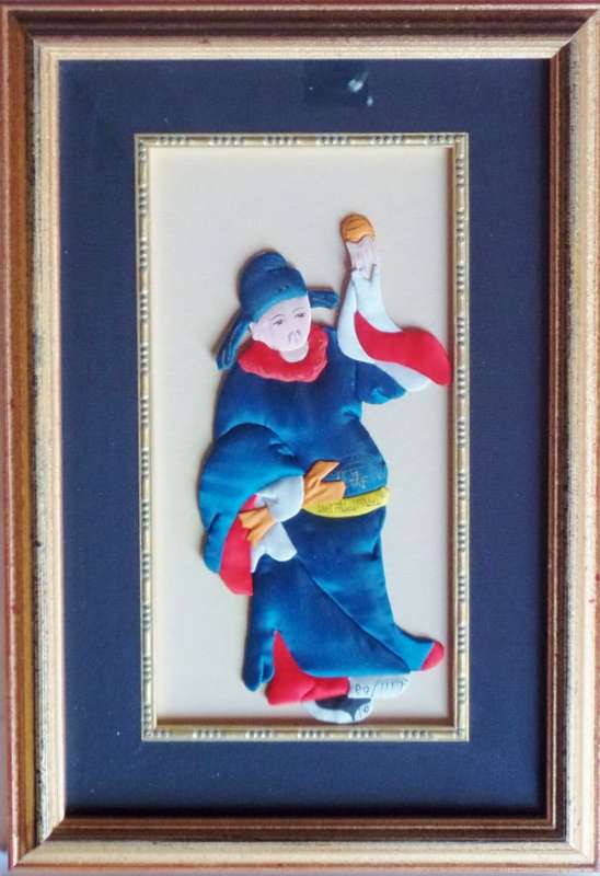 VINTAGE FRAMED SET OF FOUR CHINESE SILK APPLIQUE FIGURES