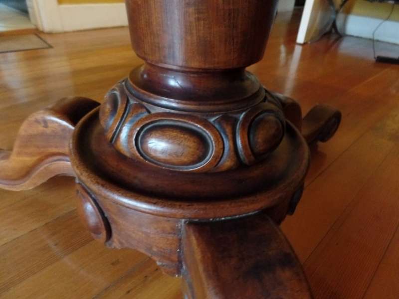 Antique tilt-top dining table