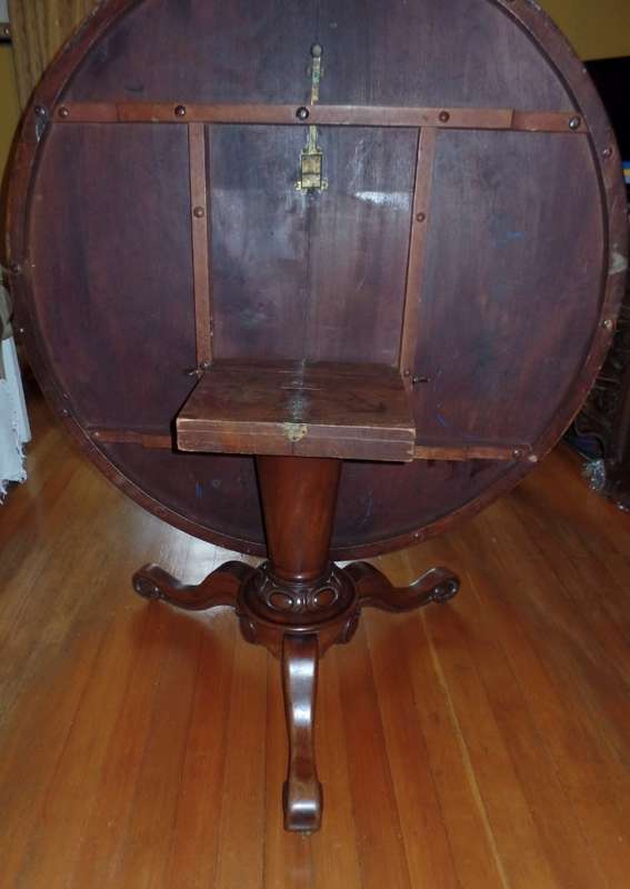 Antique tilt-top dining table