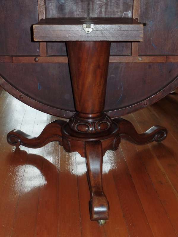 Antique tilt-top dining table