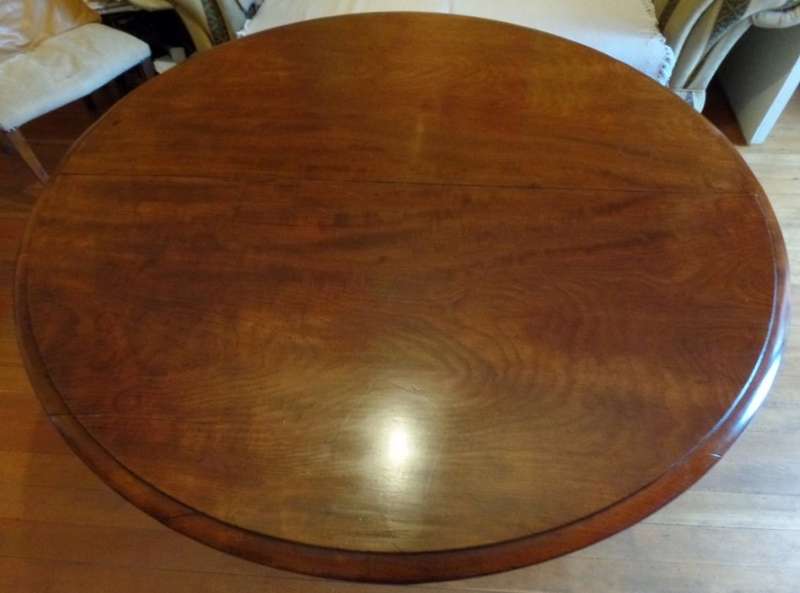 Antique tilt-top dining table