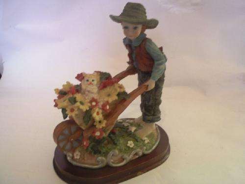 Little Gardening Boy with Wheel Barrow