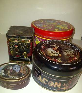 FOUR COLLECTABLE TINS