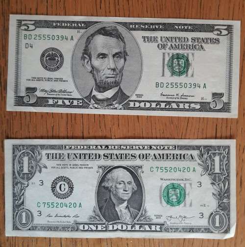 4x 1 Dollar Notes and 1x 5 Dollar Note