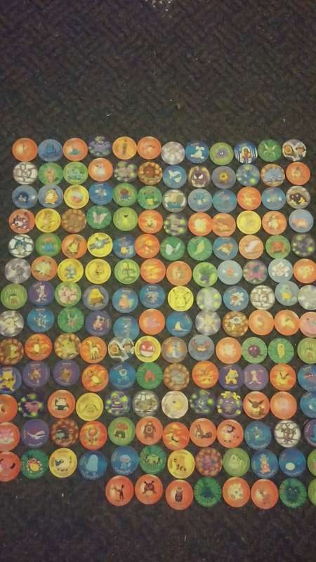 A huge lot of pokemon Tazos PLUS LEGENDARY POKEMONS