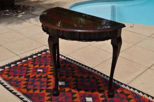 Stinkwood Ball & Claw Half Moon Table With Glass Top.  --  Collections Only!!!