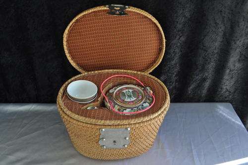 Oriental Tea Pot With Two Cups In Basket