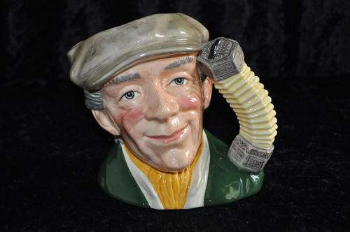 Royal Doulton Character Toby Jug - D6775 --  "The Busker"  ---  Damaged See Pic.