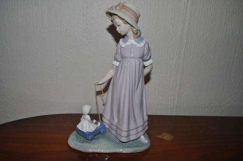 Lladro Gigurine Girl Pulling Doll