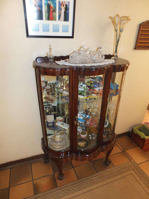 **LOOK** A LOVELY BALL AND CLAW DISPLAY CABINET.
