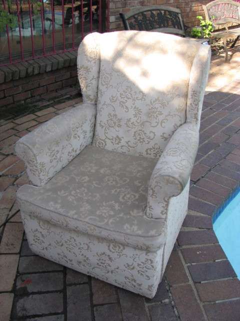 A BEAUTIFUL VINTAGE WING BACK EASY CHAIR IN EXCELLENT CONDITION