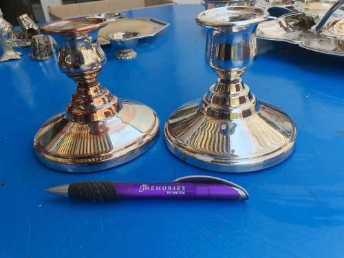 A PAIR OF VINTAGE CANDLESTICKS