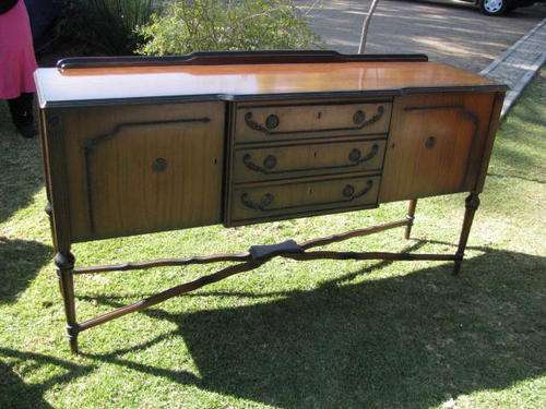 A MAHOGANY SIDEBOARD...FRENCH INSPIRED ON TURNED LEGS WITH LOVELY STRETCHER