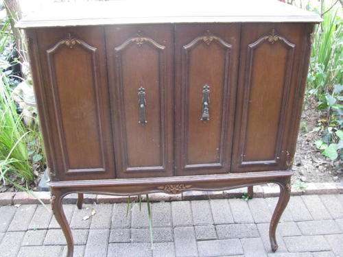 AN INTERESTING CUPBOARD........ ADD A SHELF AND LIMEWASH AND IT'S A STUNNING FRENCH INSPIRED ITEM