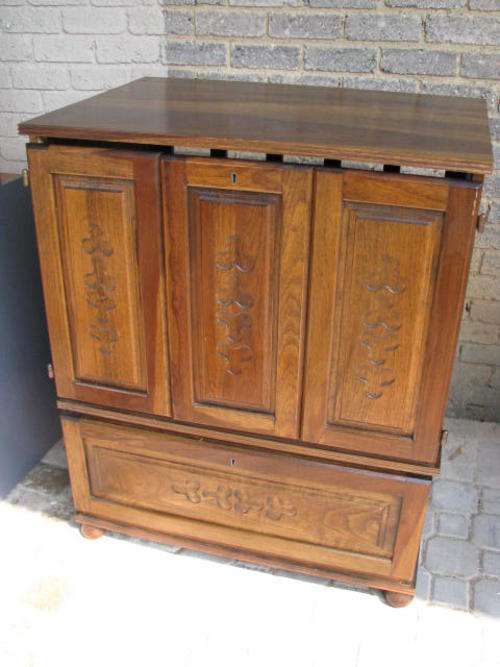 A TV CABINET ON BUN FEET....... MADE BY ADAM BEDE