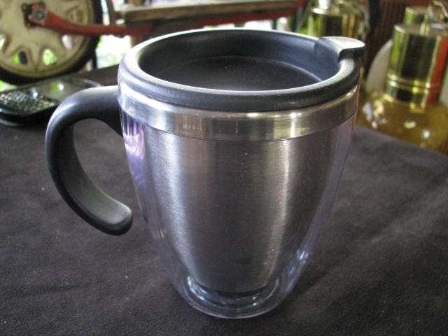 A STAINLESS STEEL JUG WITH LID..........NICE UNUSED ITEM IN GOOD CONDITION