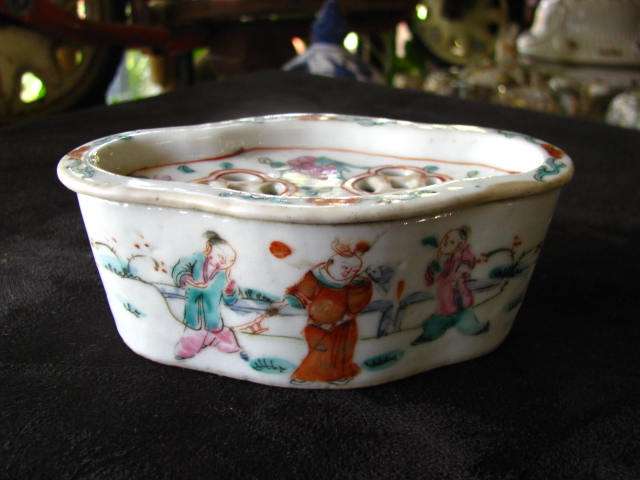 A VERY OLD ORIENTAL CONTAINER WITH PIERCED LID