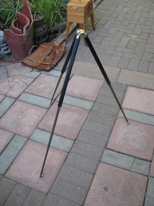 A VINTAGE TRIPOD WITH BRASS EXTENDABLE LEGS..... MADE IN WEST GERMANY