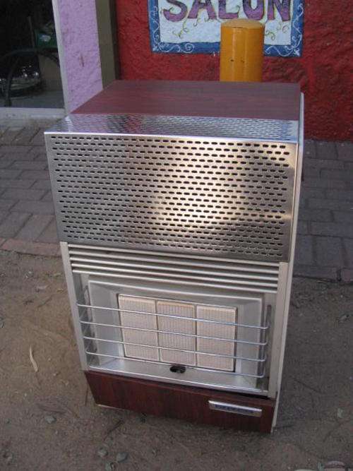 A VERY ATTRACTIVE ALVIMA GAS HEATER... LARGE WITH CHROME FRONT @ CRRRAAAZZZYY R1 START.