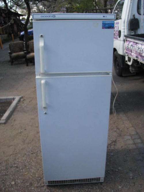 AN OCEAN FRIDGE/FREEZER IN GOOD CONDITION AND DEFINITELY WORKING.... 260 LITER